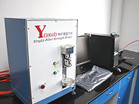 Single fiber strength tester